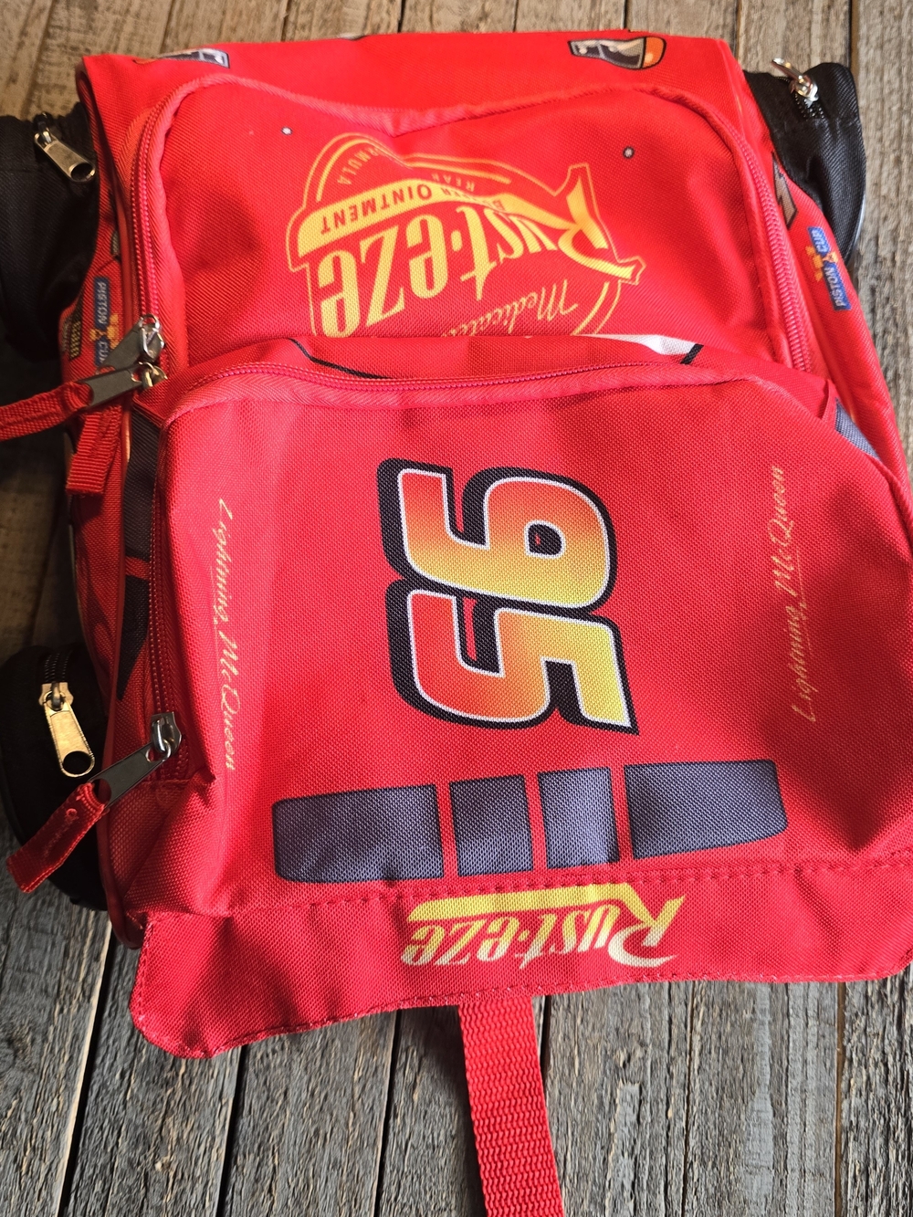 Disney Pixar Cars Lightning McQueen backpack- Rust-eze and the number 95